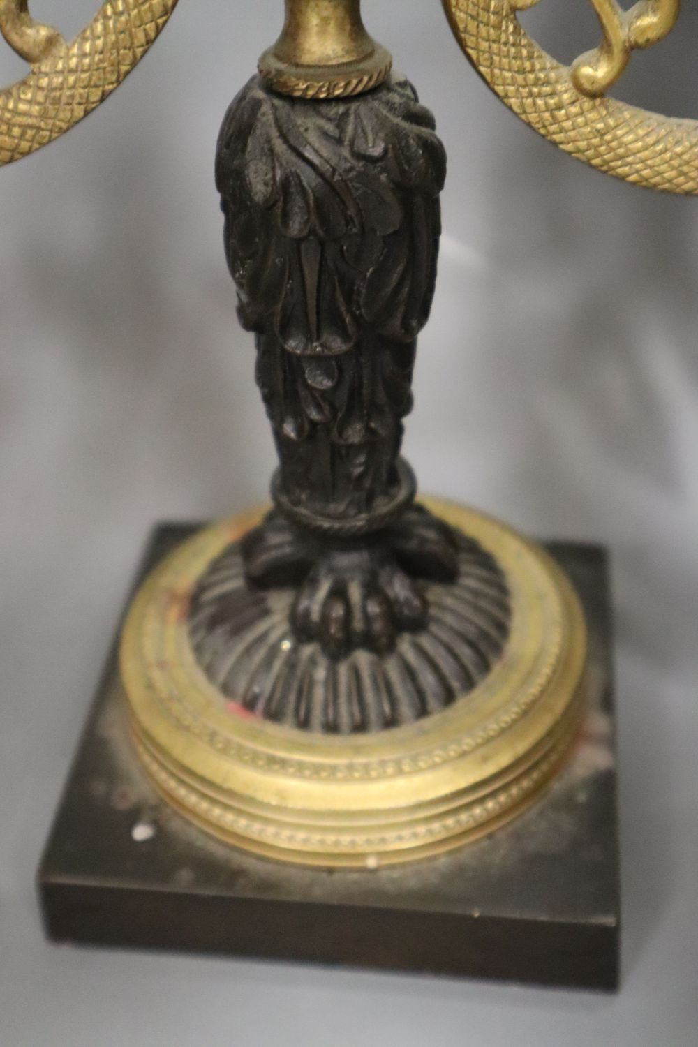 A pair of Regency two branch two light lustres, width 27cm, and a miniature bust